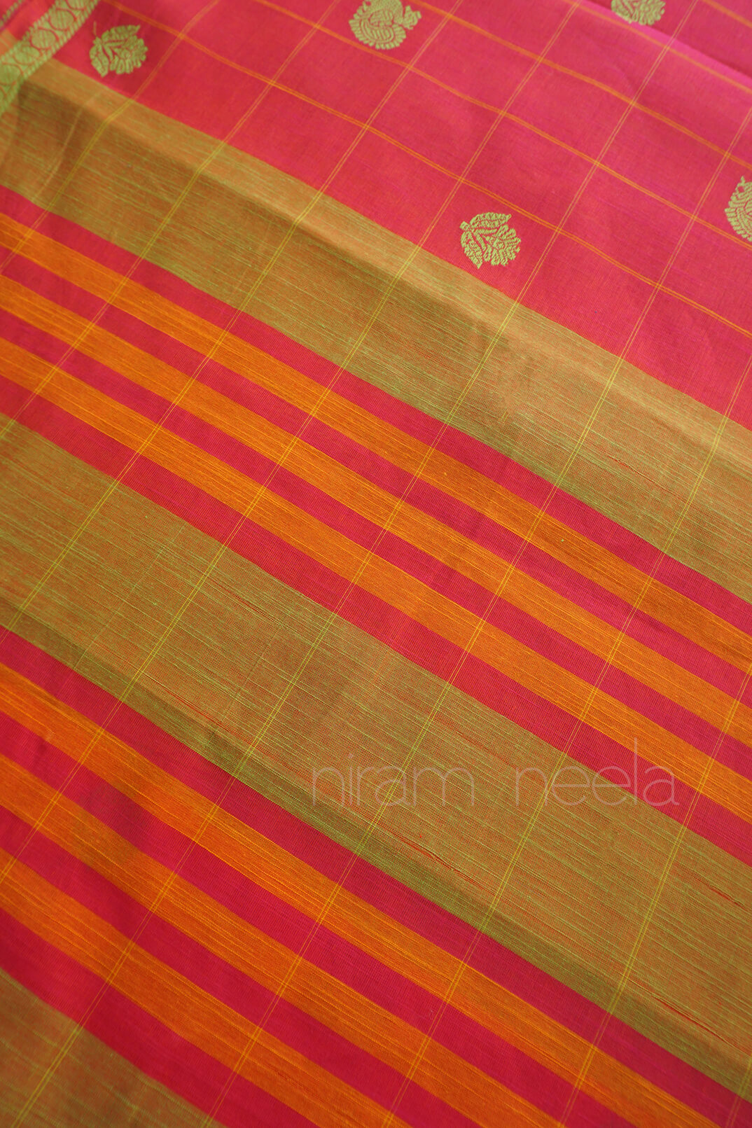 Pink and olive green Godavari cotton saree in checks from Niram Neela