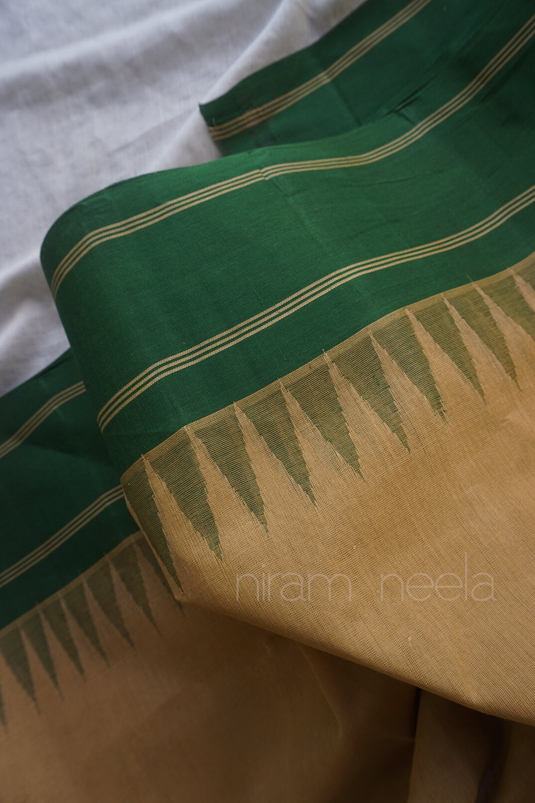 Cream and green handloom Godavari cotton saree from Niram Neela