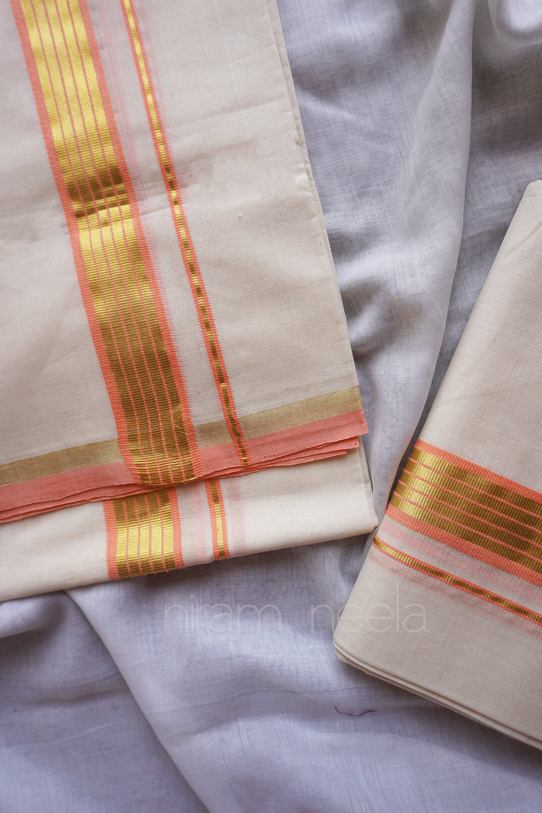 Ivory and peach set mundu - Niram Neela