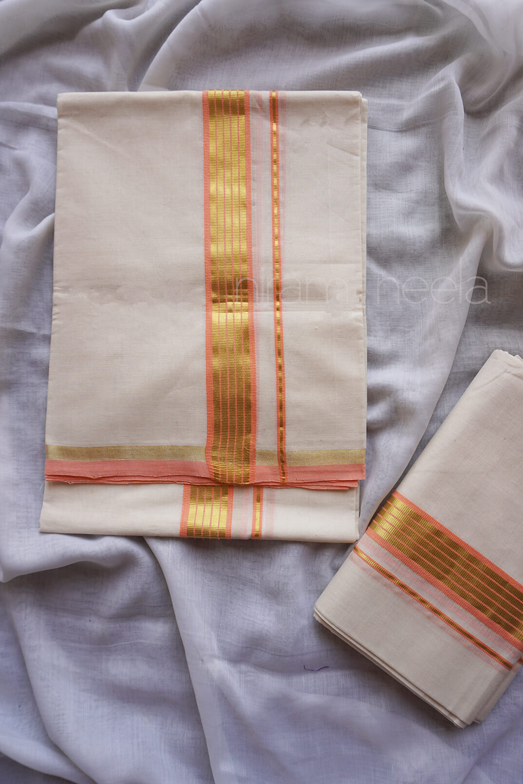 Ivory and peach set mundu - Niram Neela