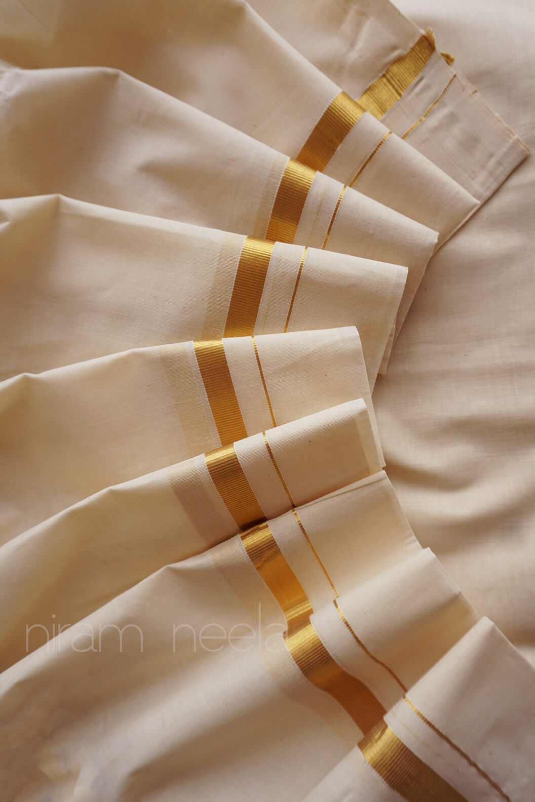 Ivory and gold double mundu - Niram Neela