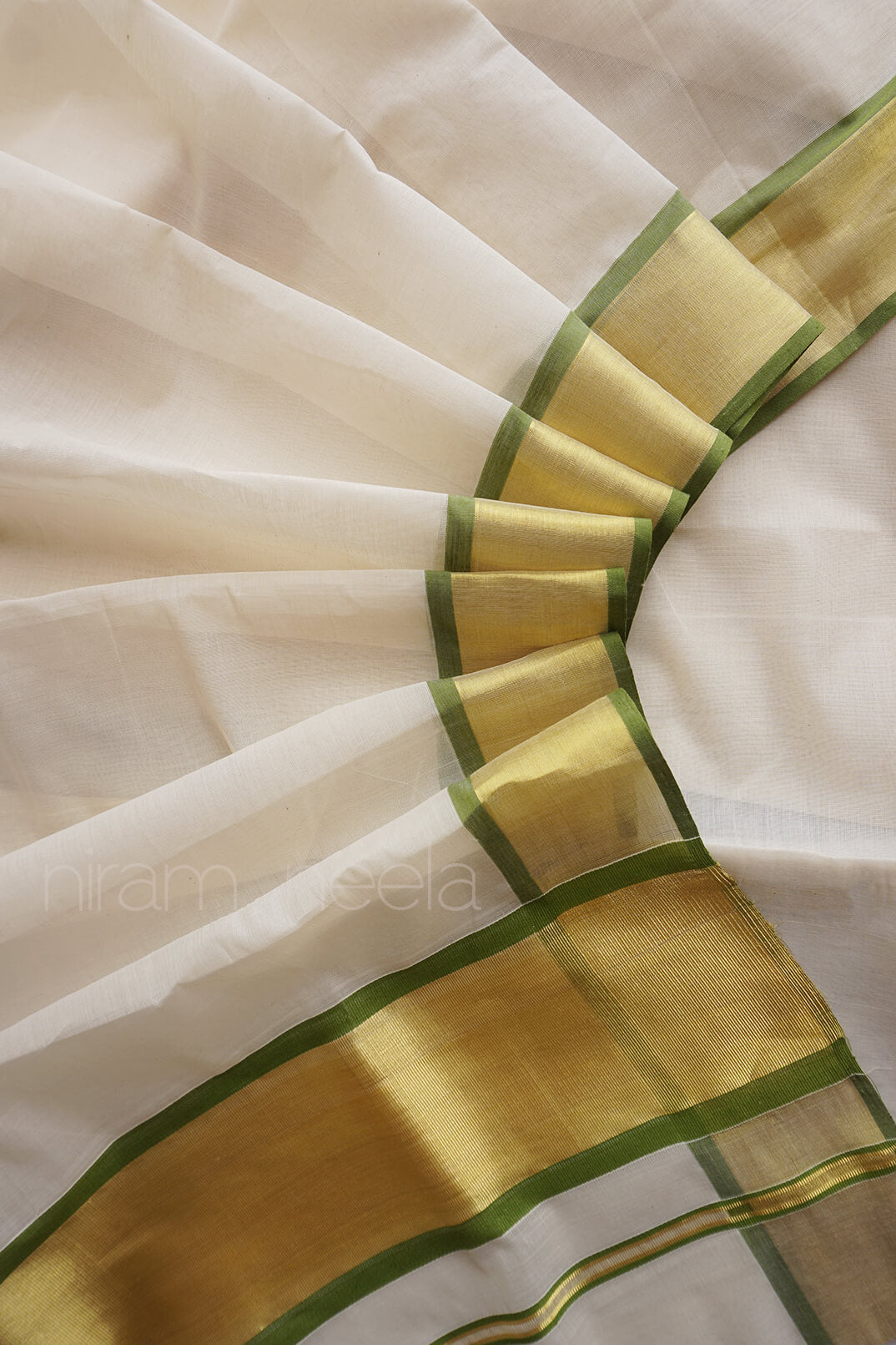 Ivory and light green Kasavu cotton saree - Niram Neela