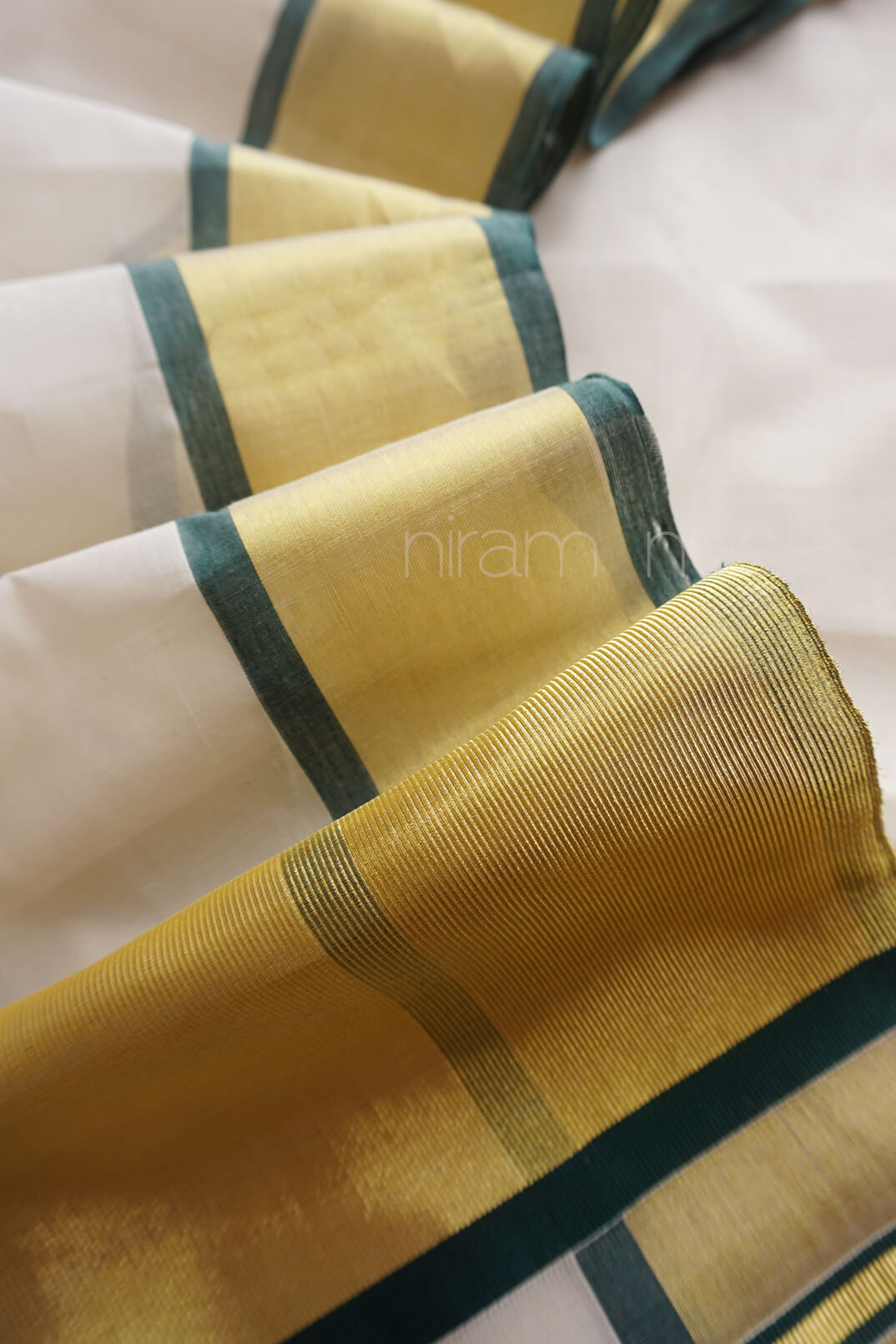 Ivory and dark green Kasavu cotton saree - Niram Neela