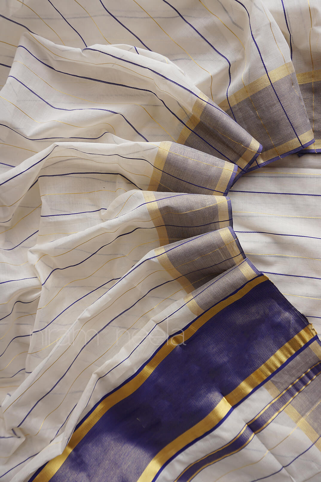 Ivory and blue striped Kasavu cotton saree - Niram Neela