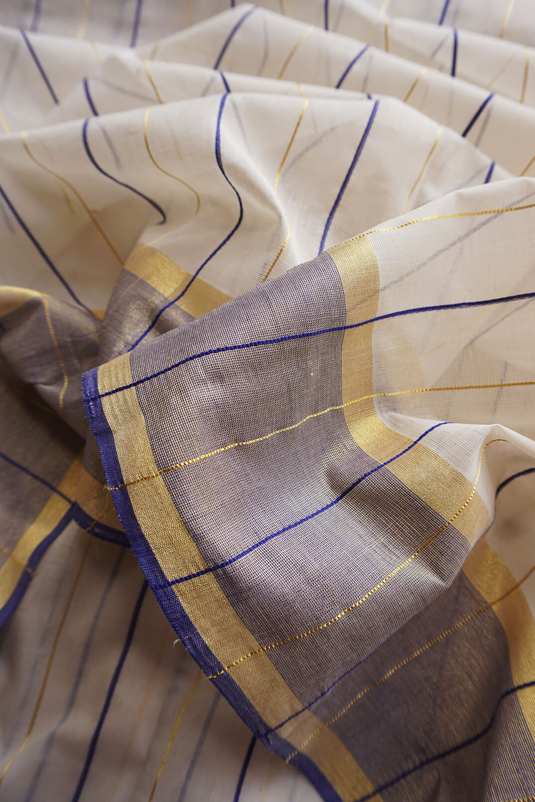 Ivory and blue striped Kasavu cotton saree - Niram Neela