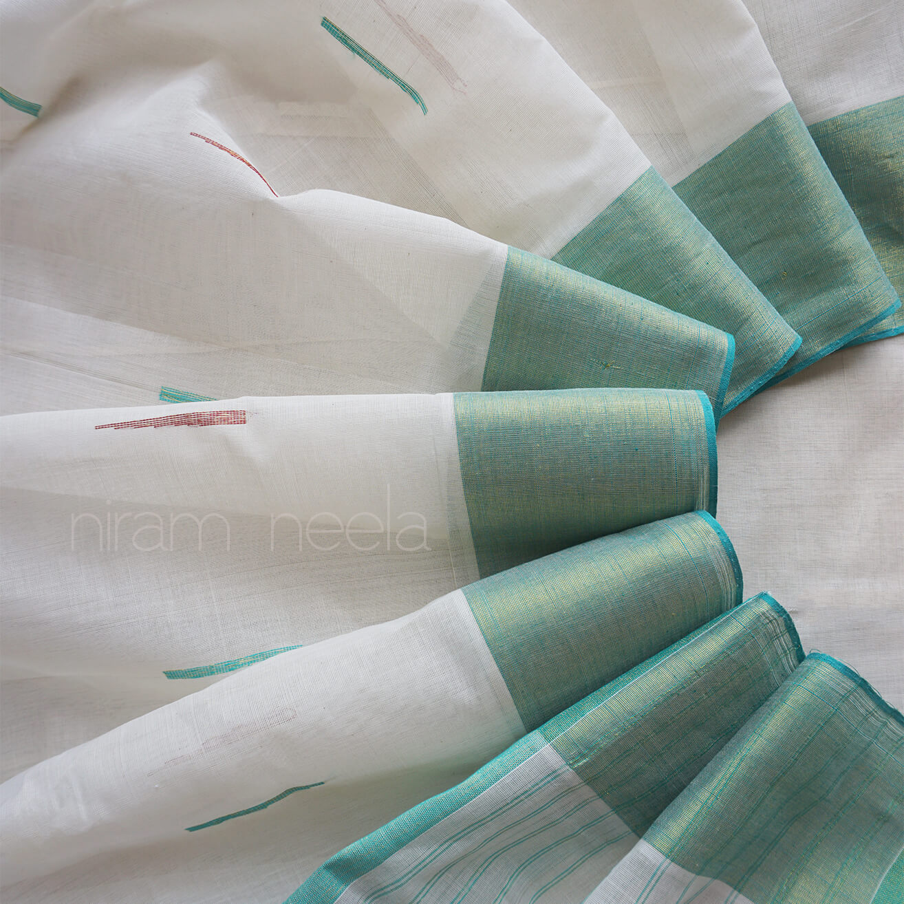 Ivory and teal green Kasavu cotton saree | Niram Neela