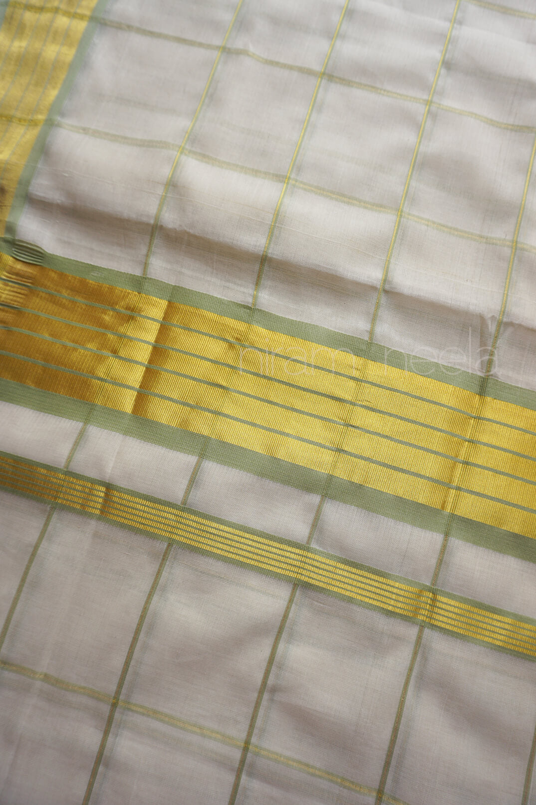 Ivory and sage green check Kasavu cotton saree | Niram Neela