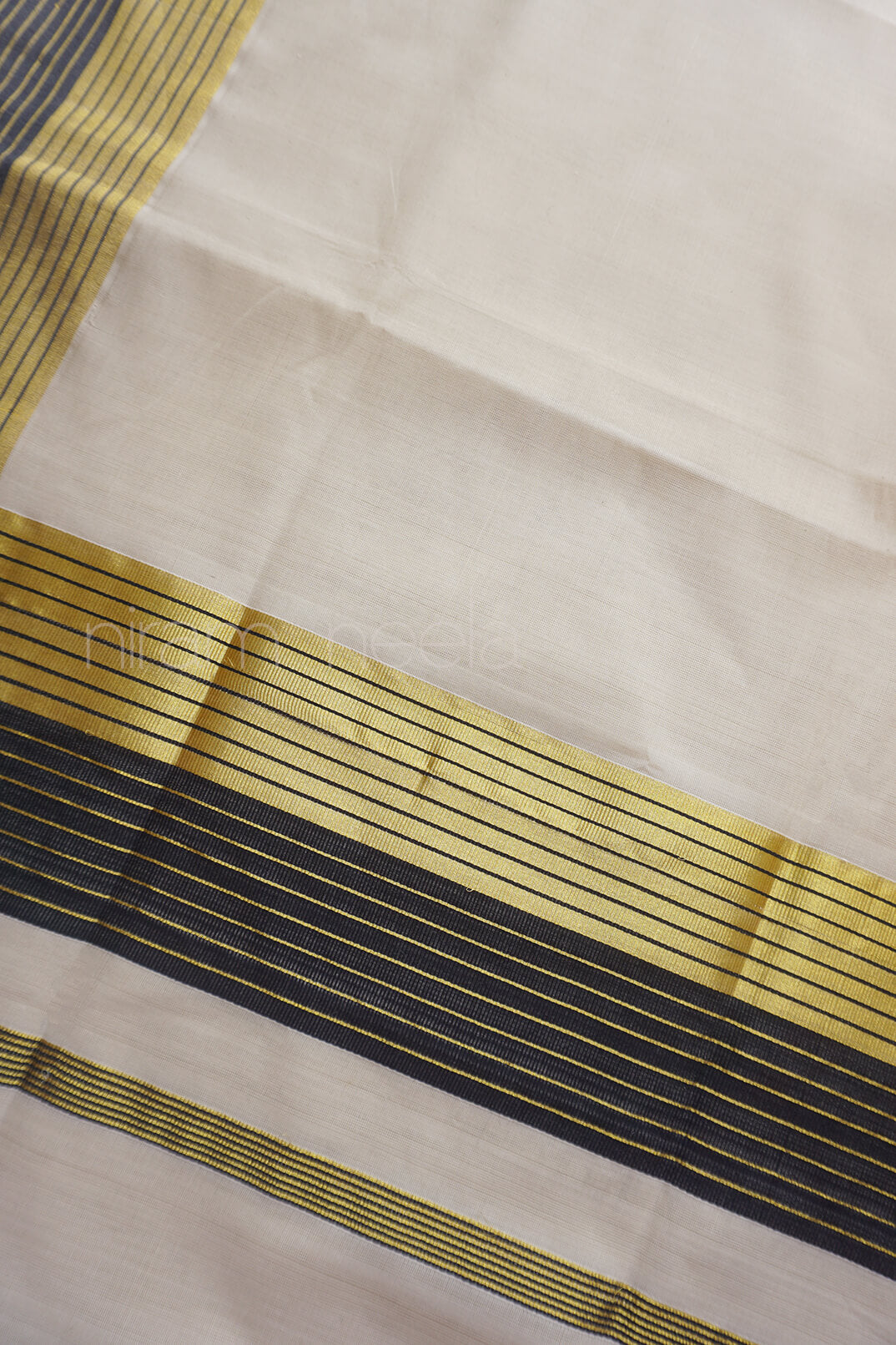 Ivory, black and gold Kasavu cotton saree | Niram Neela