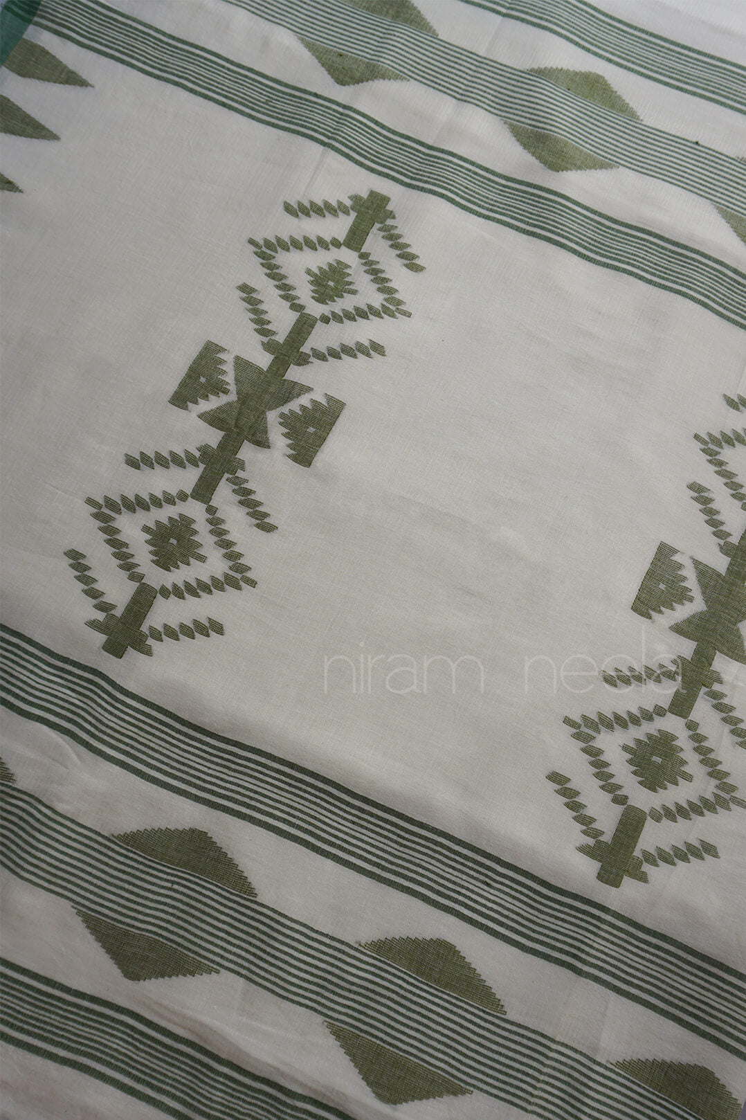 White and green Bengal jamdani silk cotton saree | Niram Neela