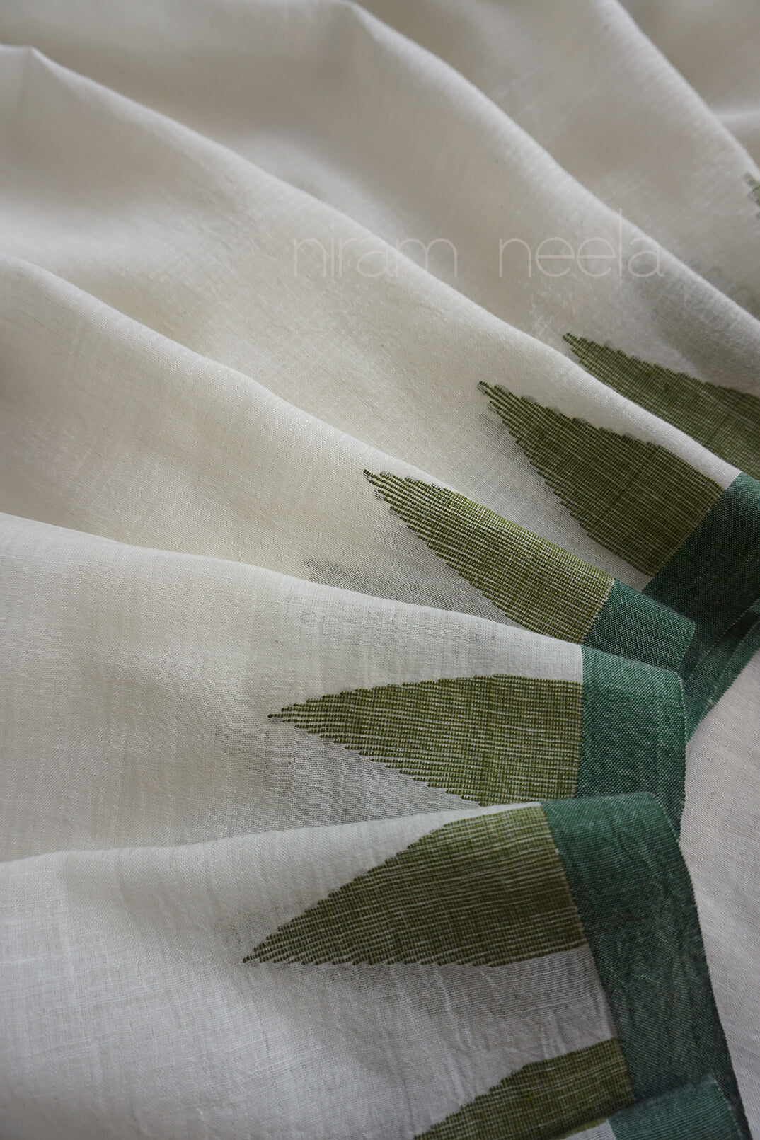 White and green Bengal jamdani silk cotton saree | Niram Neela