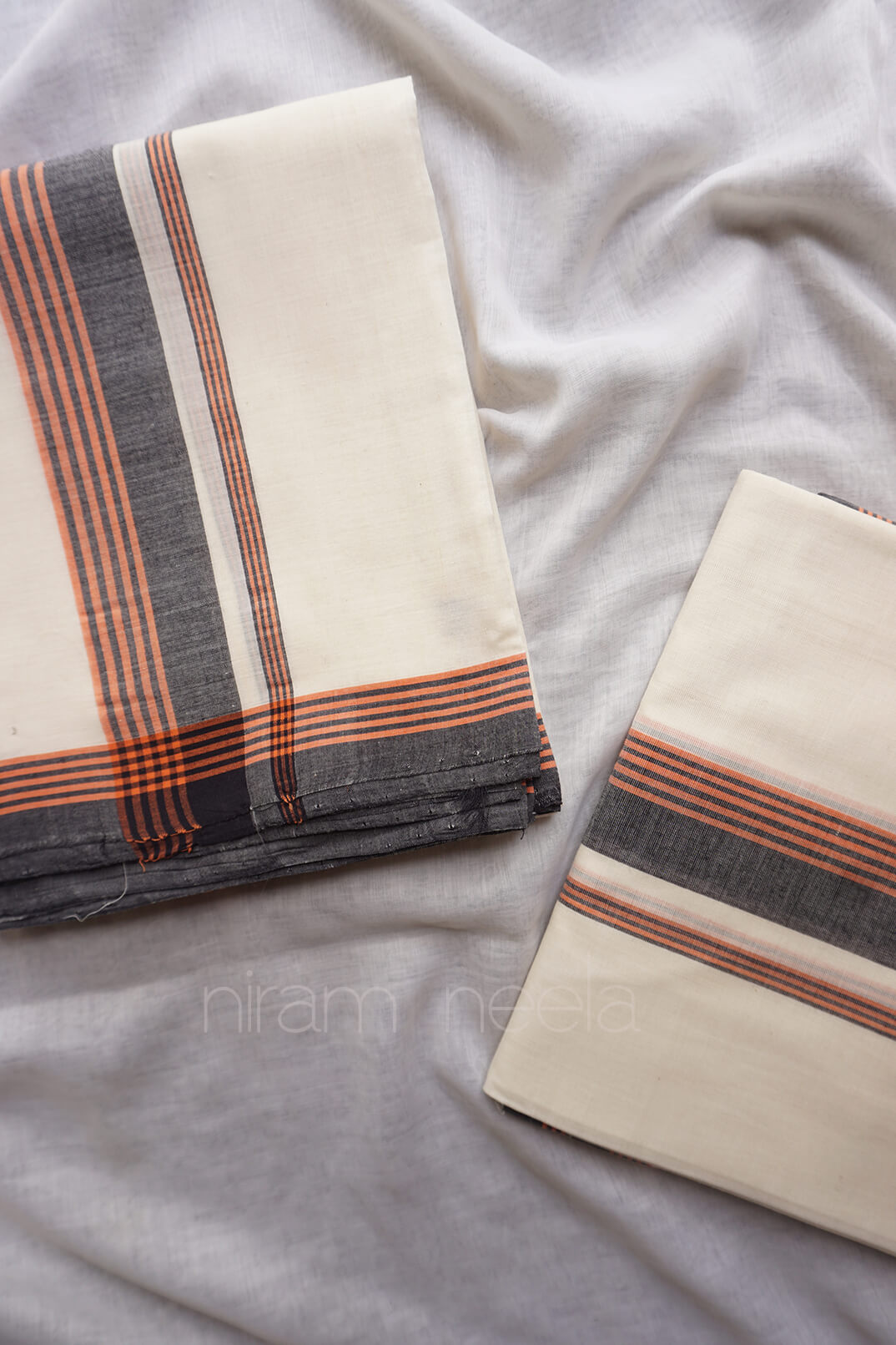 Ivory,black and orange single set mundu - Niram Neela