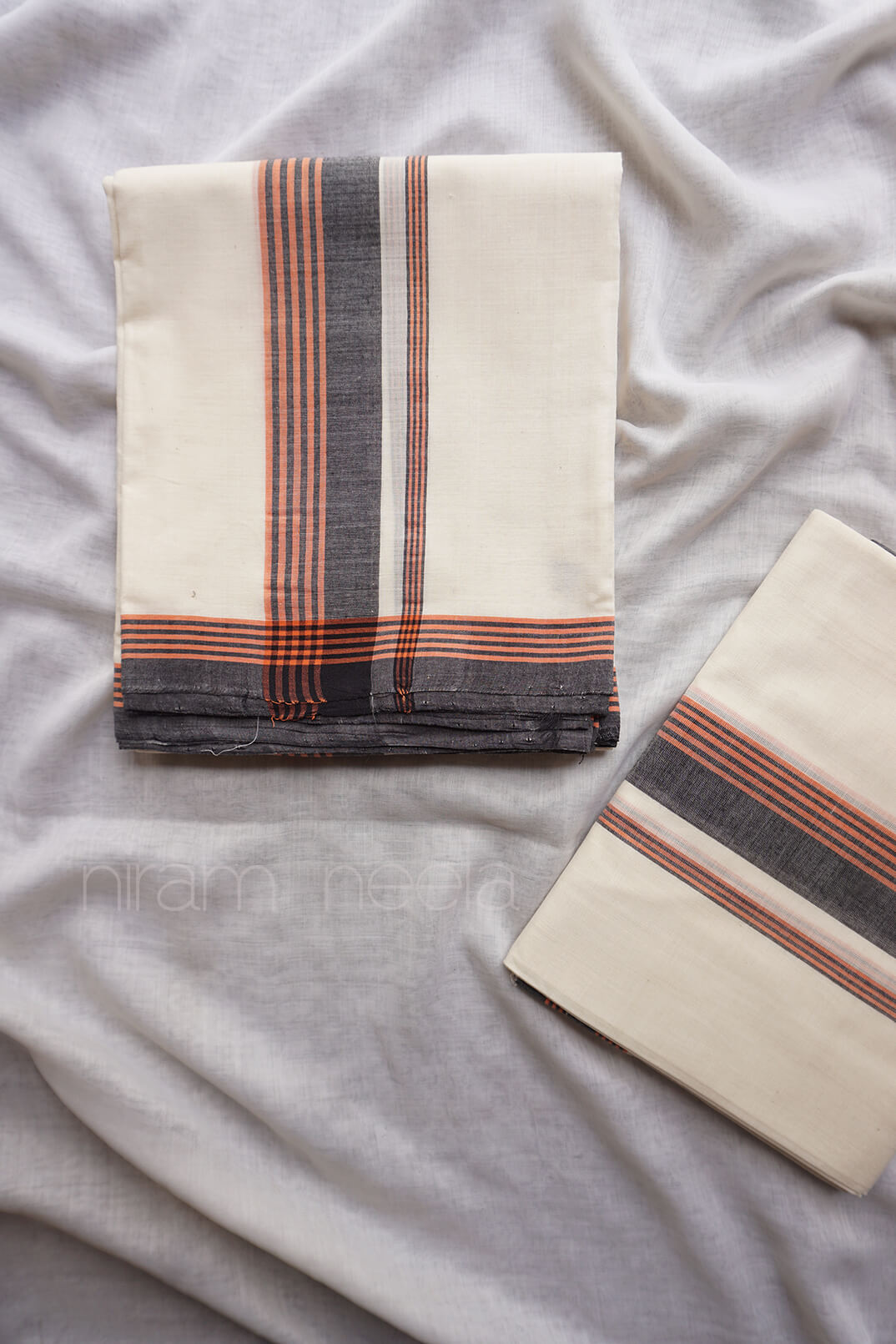 Ivory,black and orange single set mundu - Niram Neela