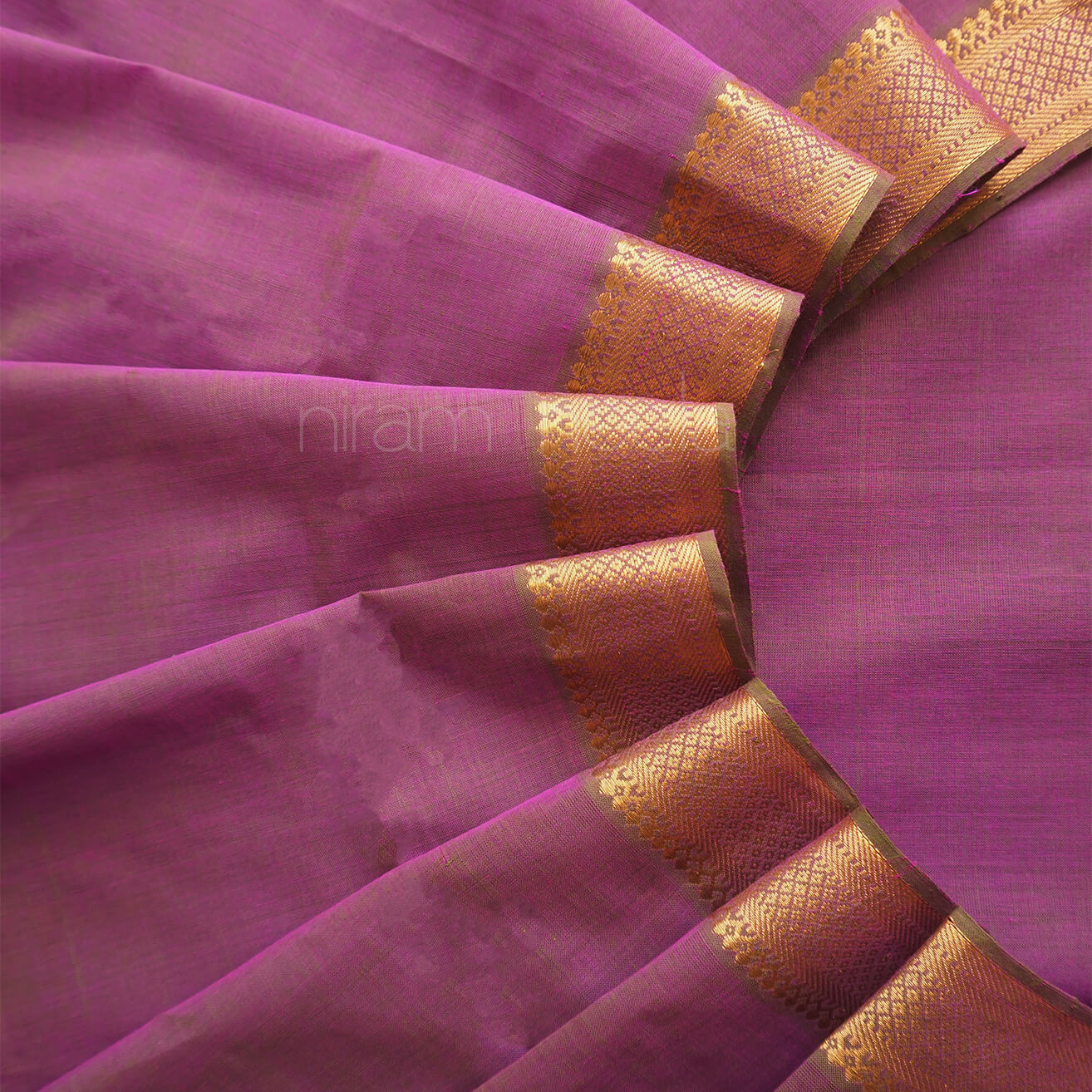 Purple and green Mangalagiri cotton saree with Nizam border from Niram Neela