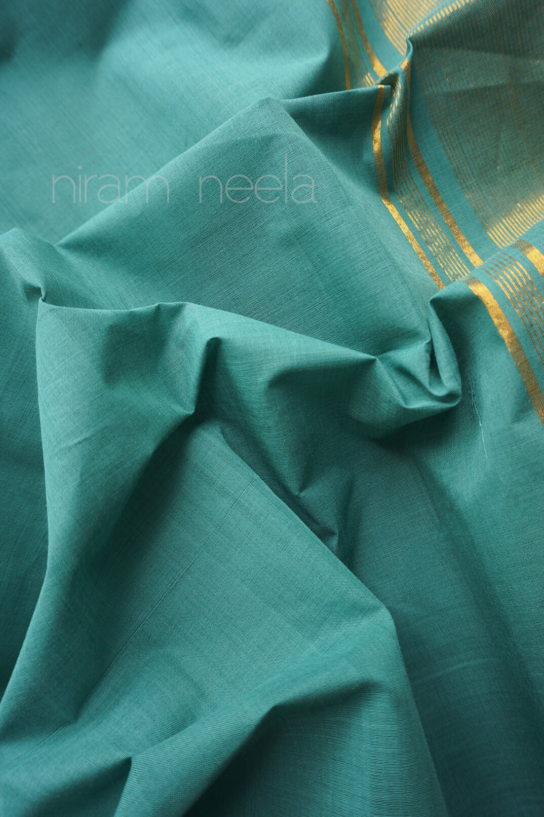 Teal and gold Mangalagiri cotton saree with Nizam border from Niram Neela