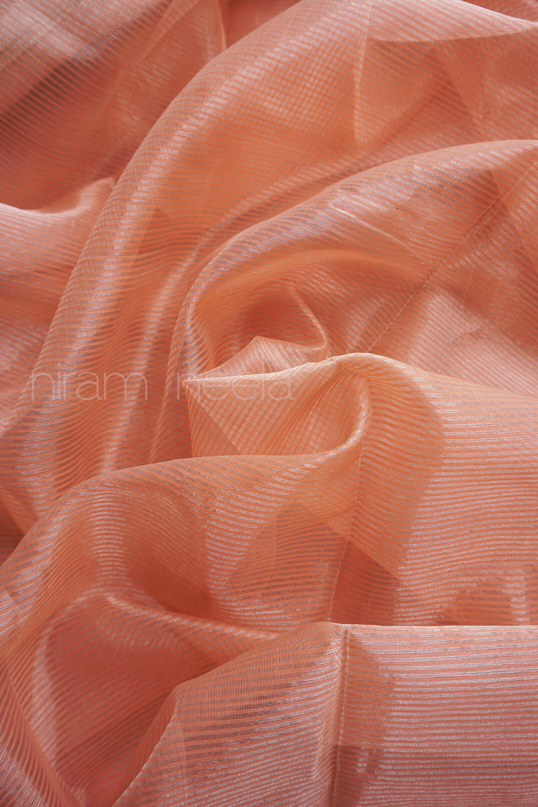 Peach Maheshwari silk cotton tissue saree