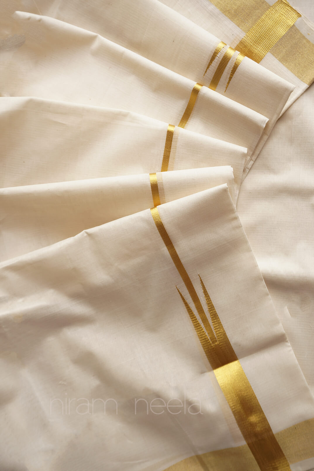 Ivory and gold chutti double mundu - Niram Neela