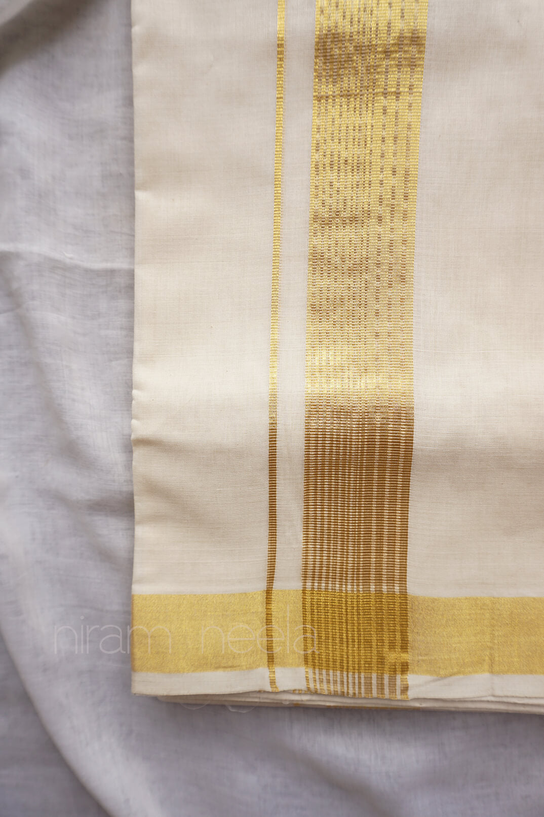 Ivory and gold kasavu double mundu - Niram Neela