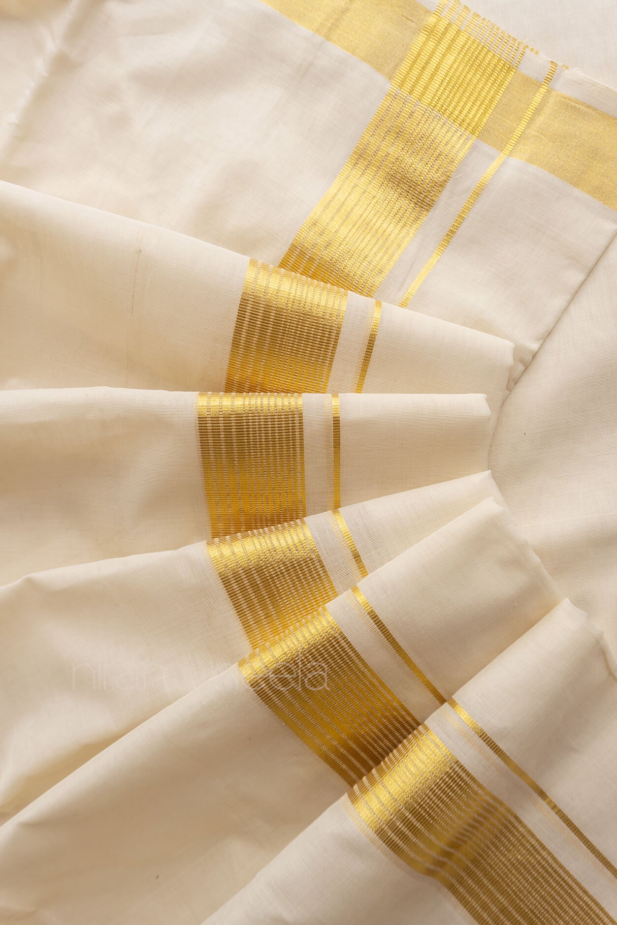 Ivory and gold kasavu double mundu - Niram Neela