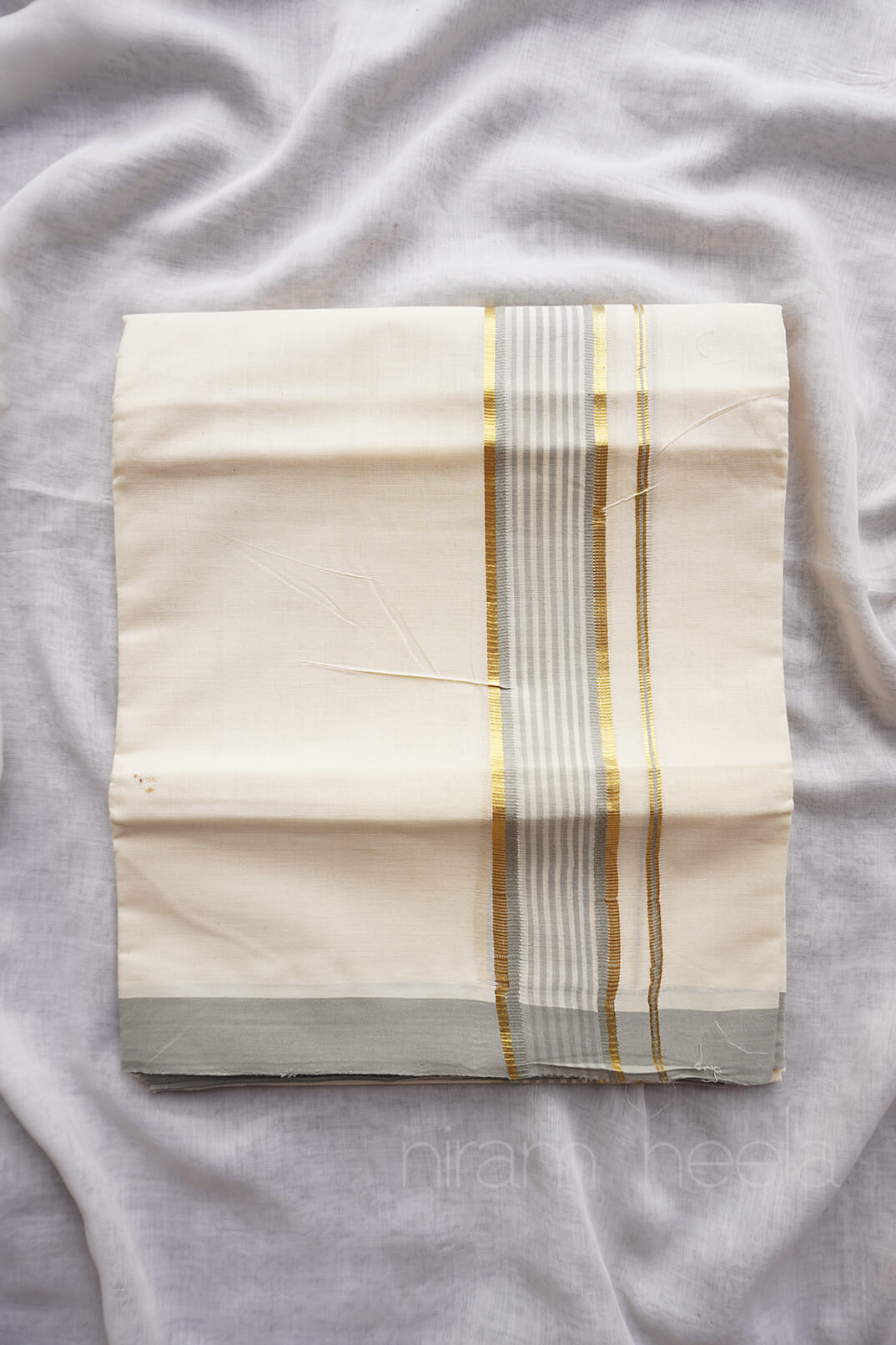 Ivory and grey kasavu double mundu - Niram Neela