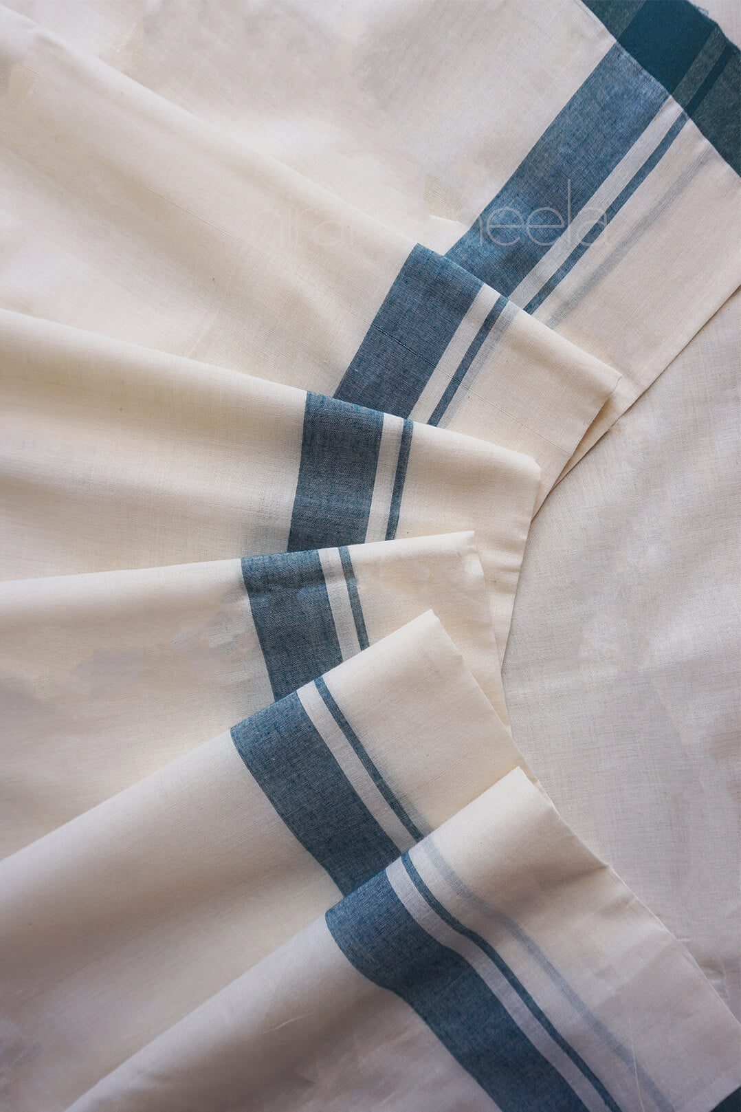 Ivory and green double mundu | Niram Neela