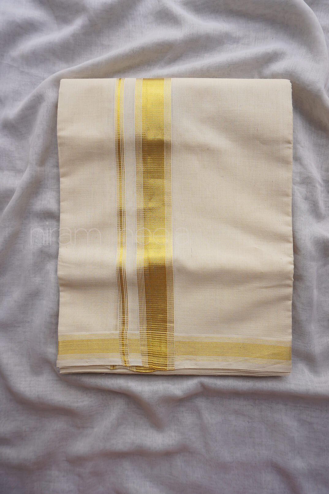 Ivory and gold kasavu double mundu | Niram Neela