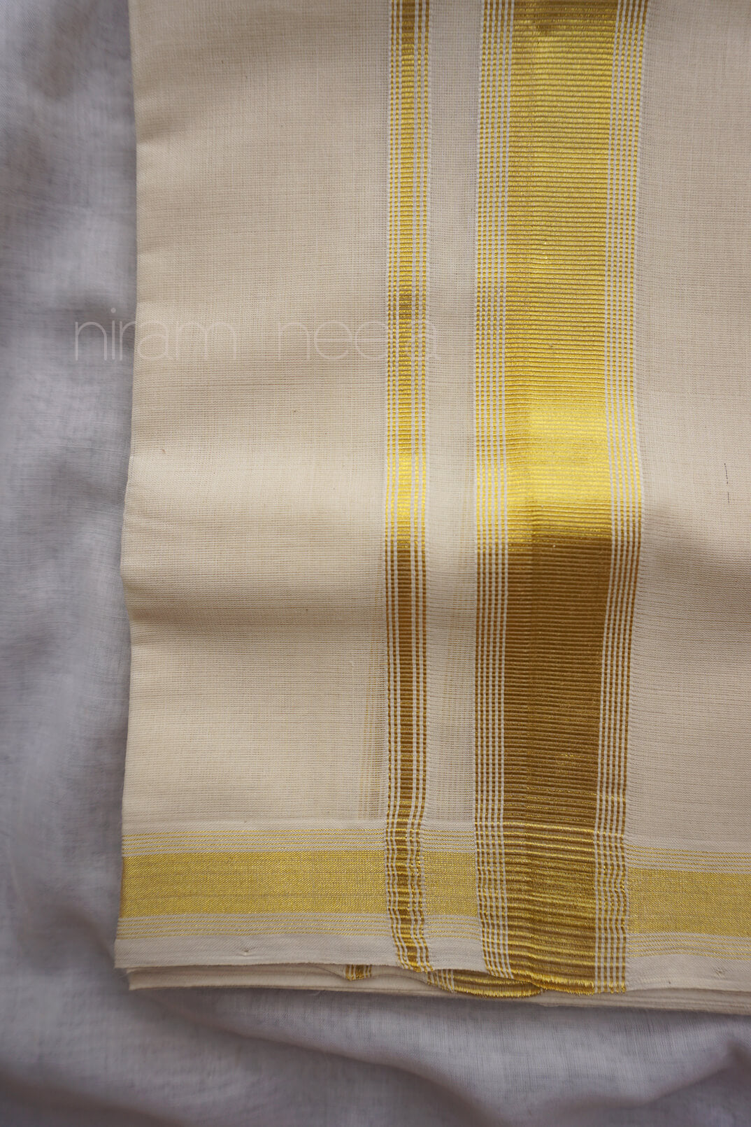 Ivory and gold kasavu double mundu | Niram Neela