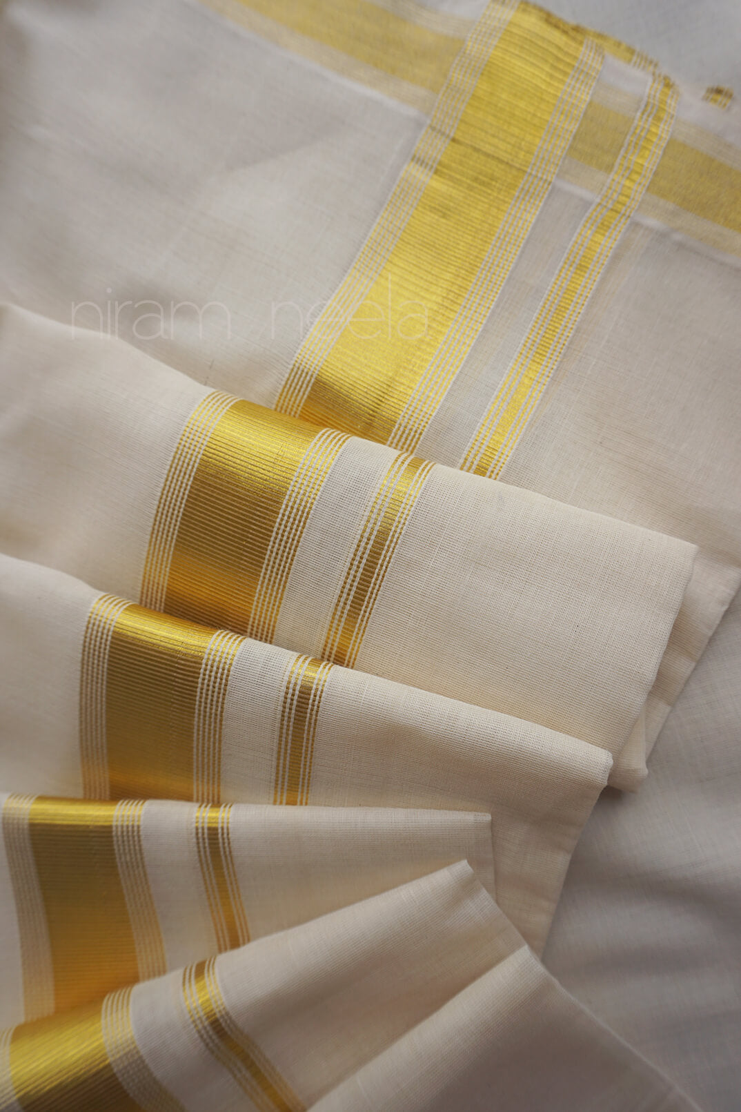 Ivory and gold kasavu double mundu | Niram Neela