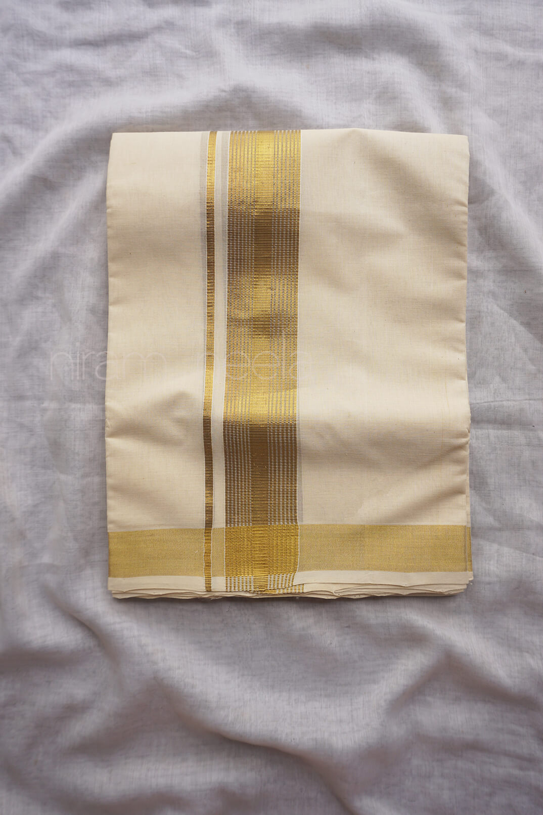 Ivory and antique gold double mundu | Niram Neela