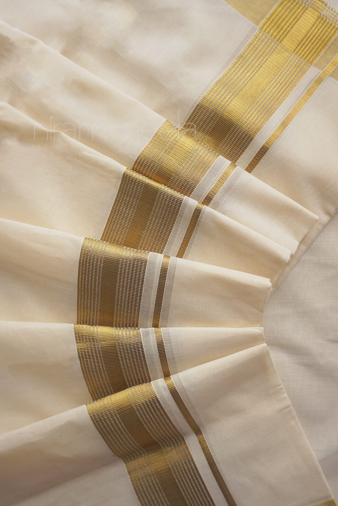 Ivory and antique gold double mundu | Niram Neela