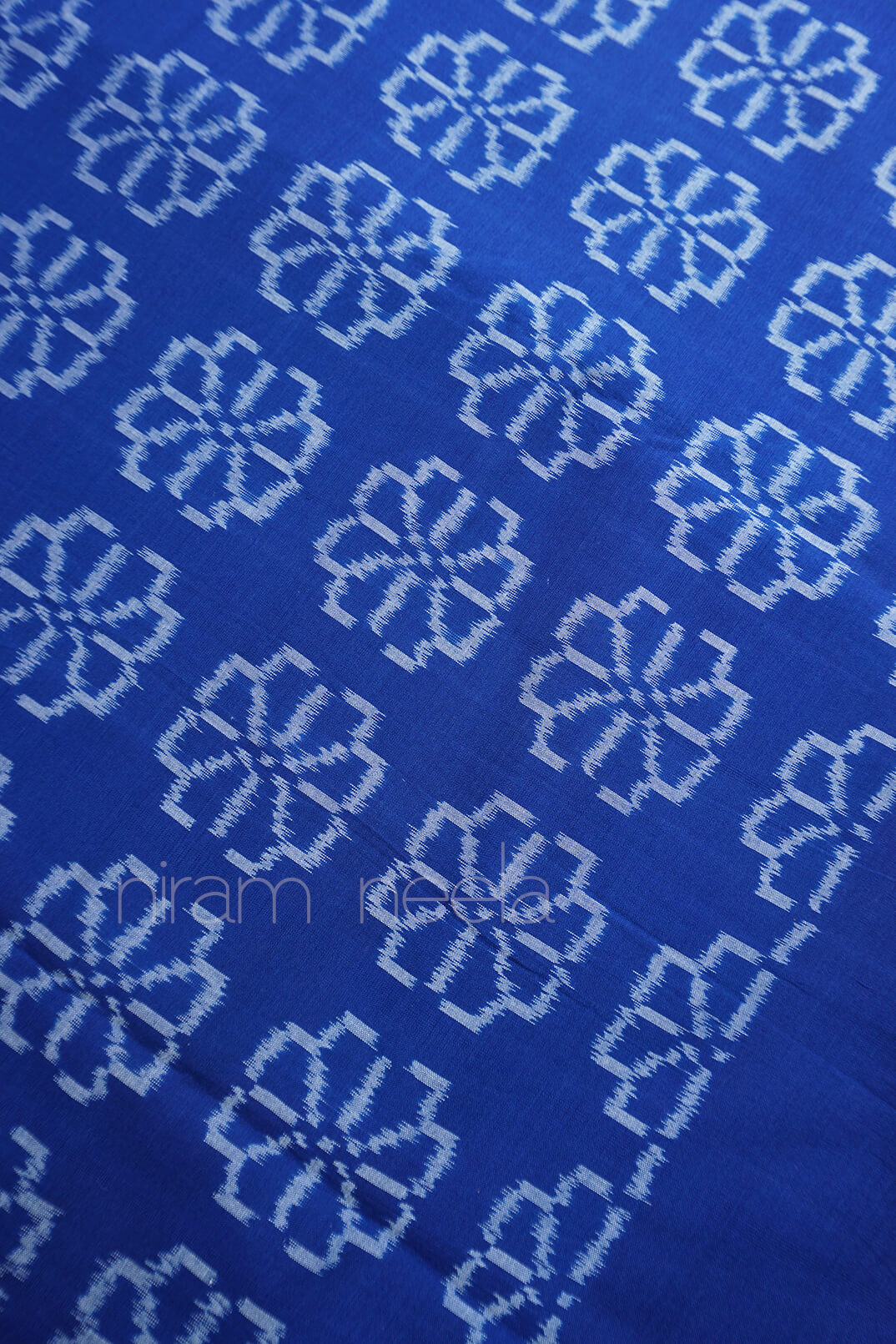 Peach and blue Pochampally ikat cotton saree - Niram Neela