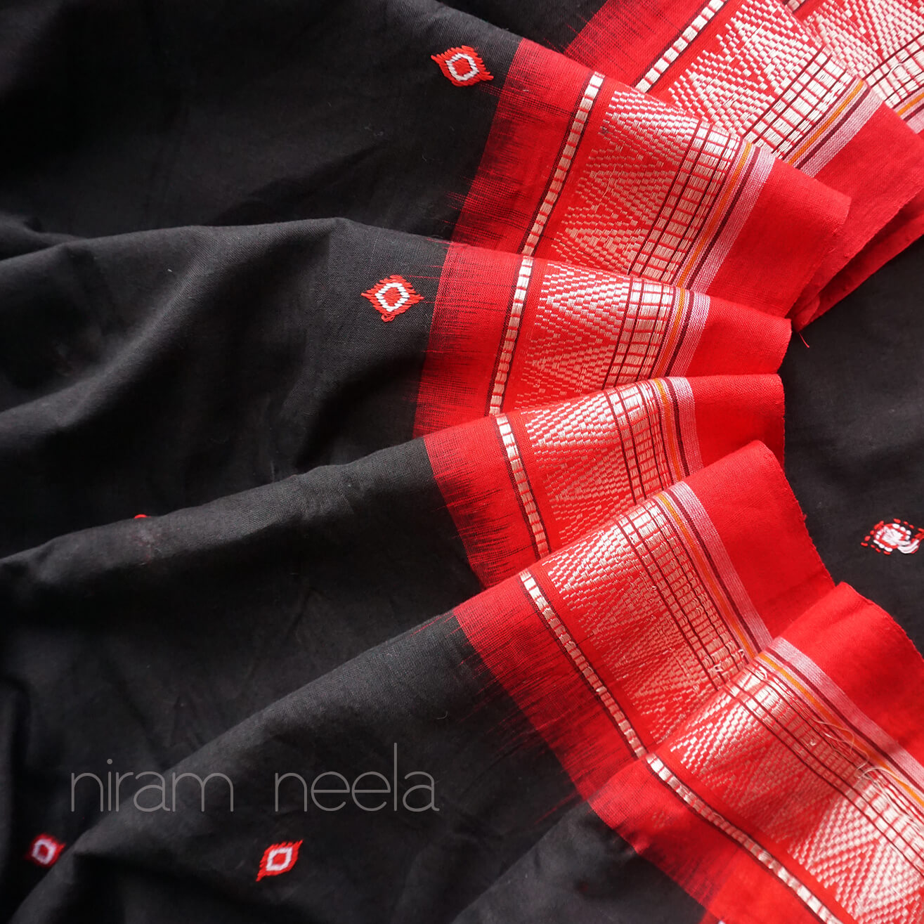 Black and red Dongria cotton saree - Niram Neela