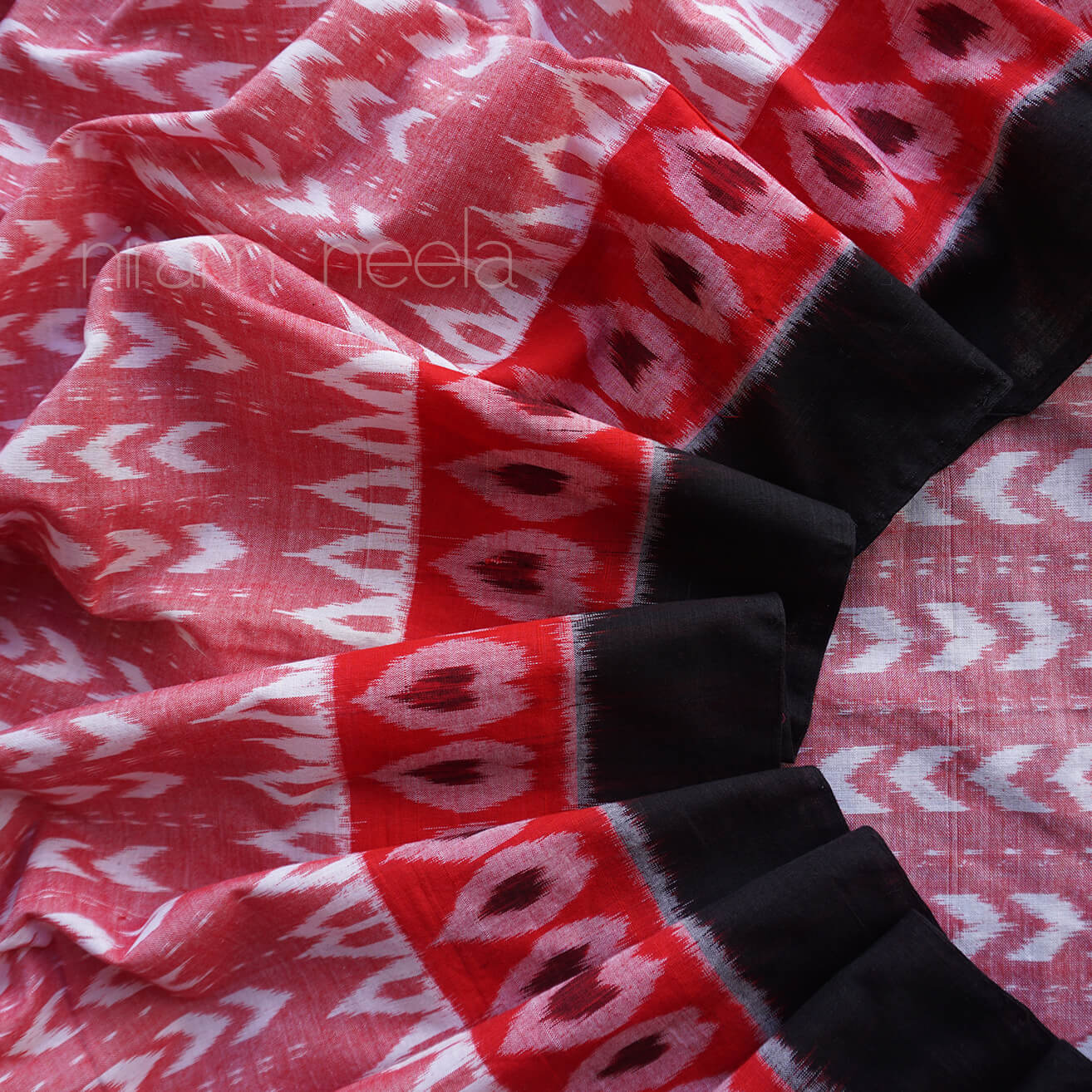 Red and black Sambalpuri ikat cotton saree - Niram Neela